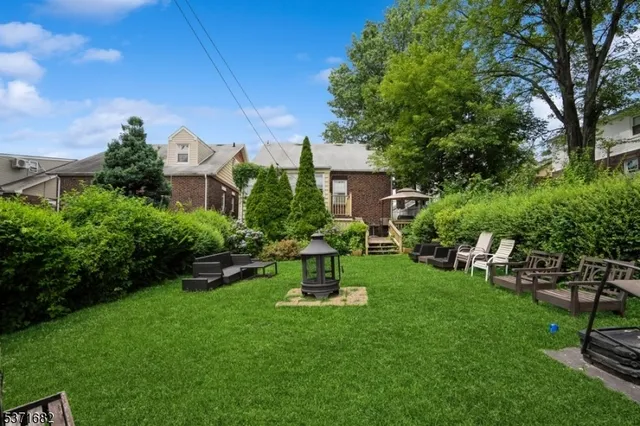 a view of a garden with a bench