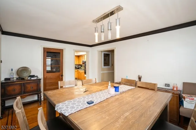 a very nice looking dining room with a table and chairs