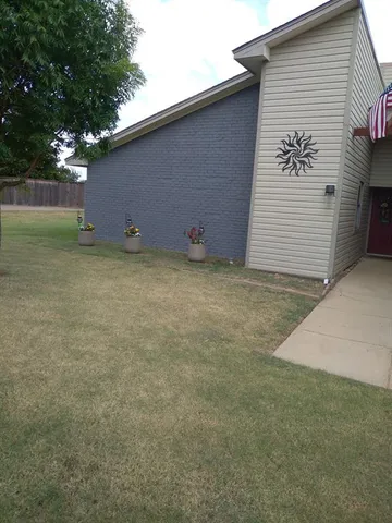 a view of outdoor space and yard