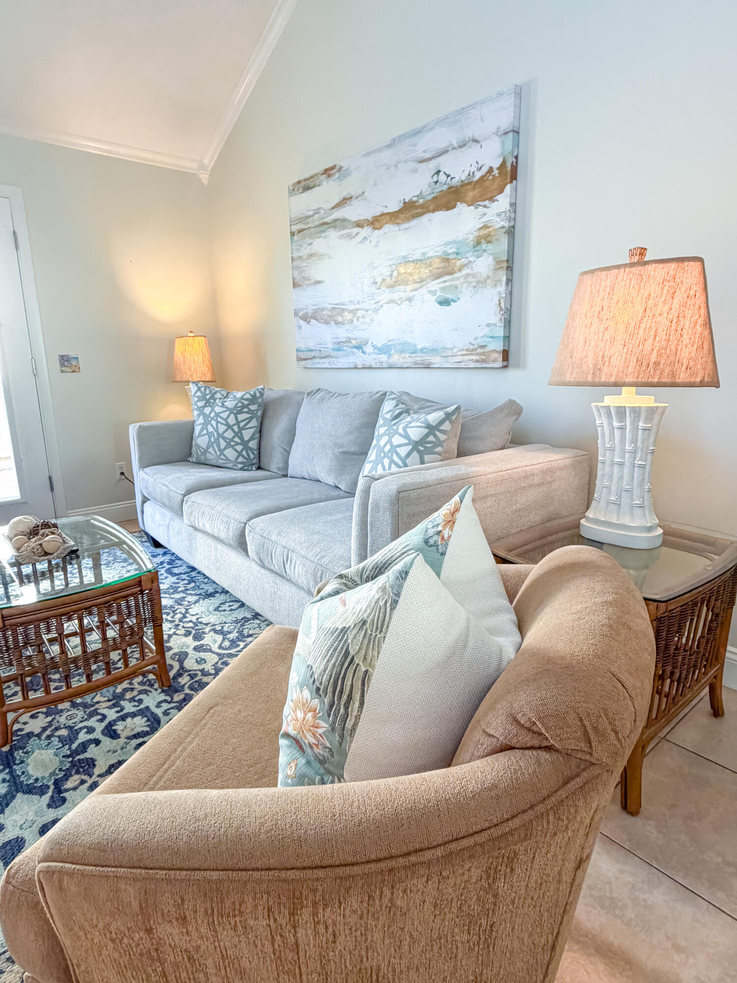 17462 Front Beach Road, Unit 38B Panama City Beach, FL 32413 - Photo 12 of 39 a living room with furniture and a lamp