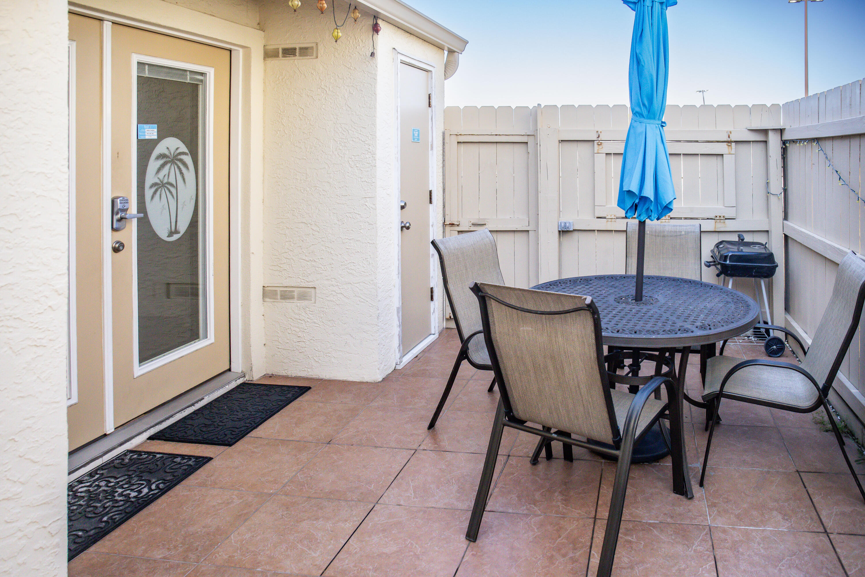 17462 Front Beach Road, Unit 38B Panama City Beach, FL 32413 - Photo 25 of 39 a view of a dining room with furniture window and wooden floor