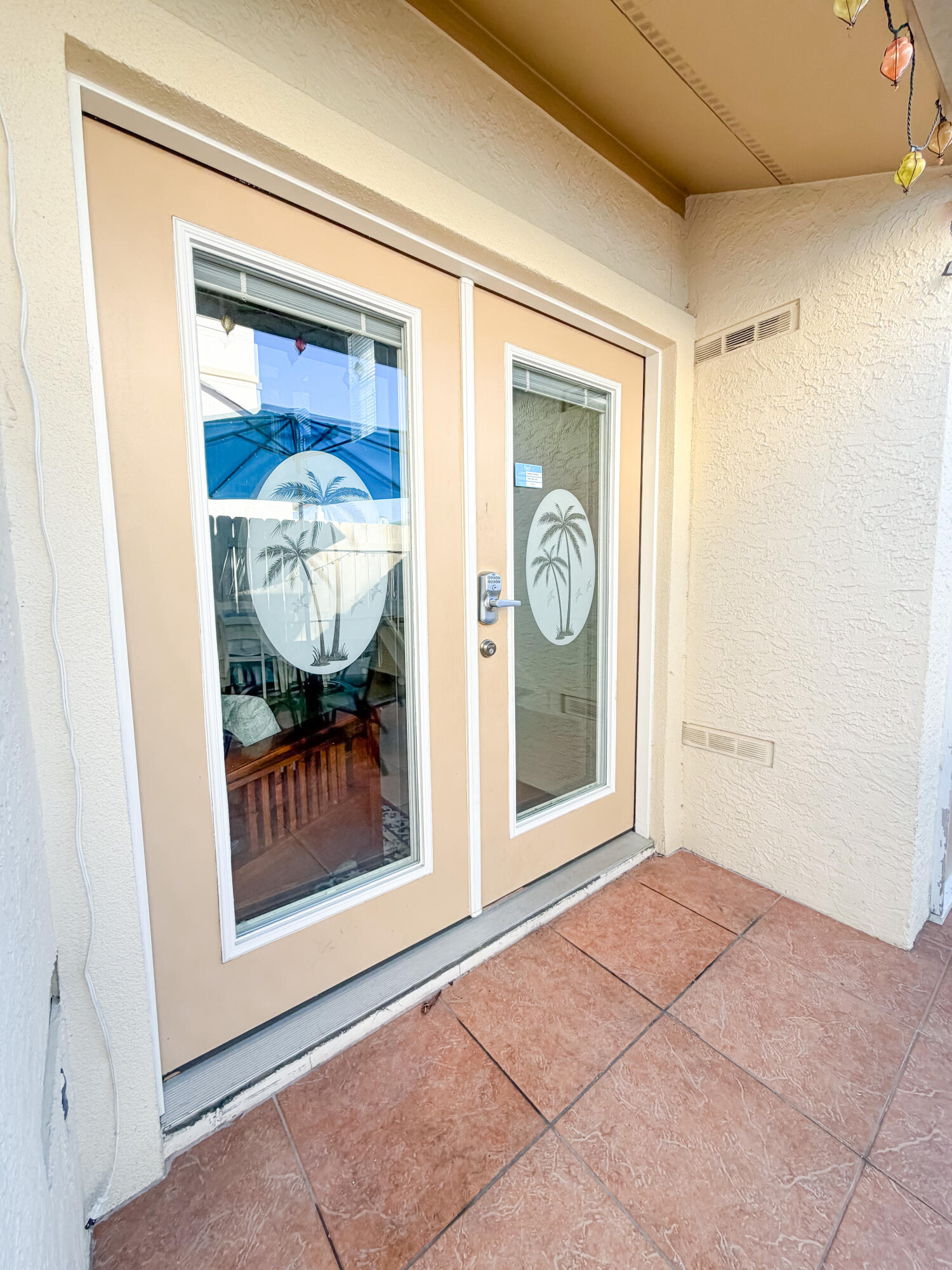 17462 Front Beach Road, Unit 38B Panama City Beach, FL 32413 - Photo 26 of 39 a view of a front door of a house