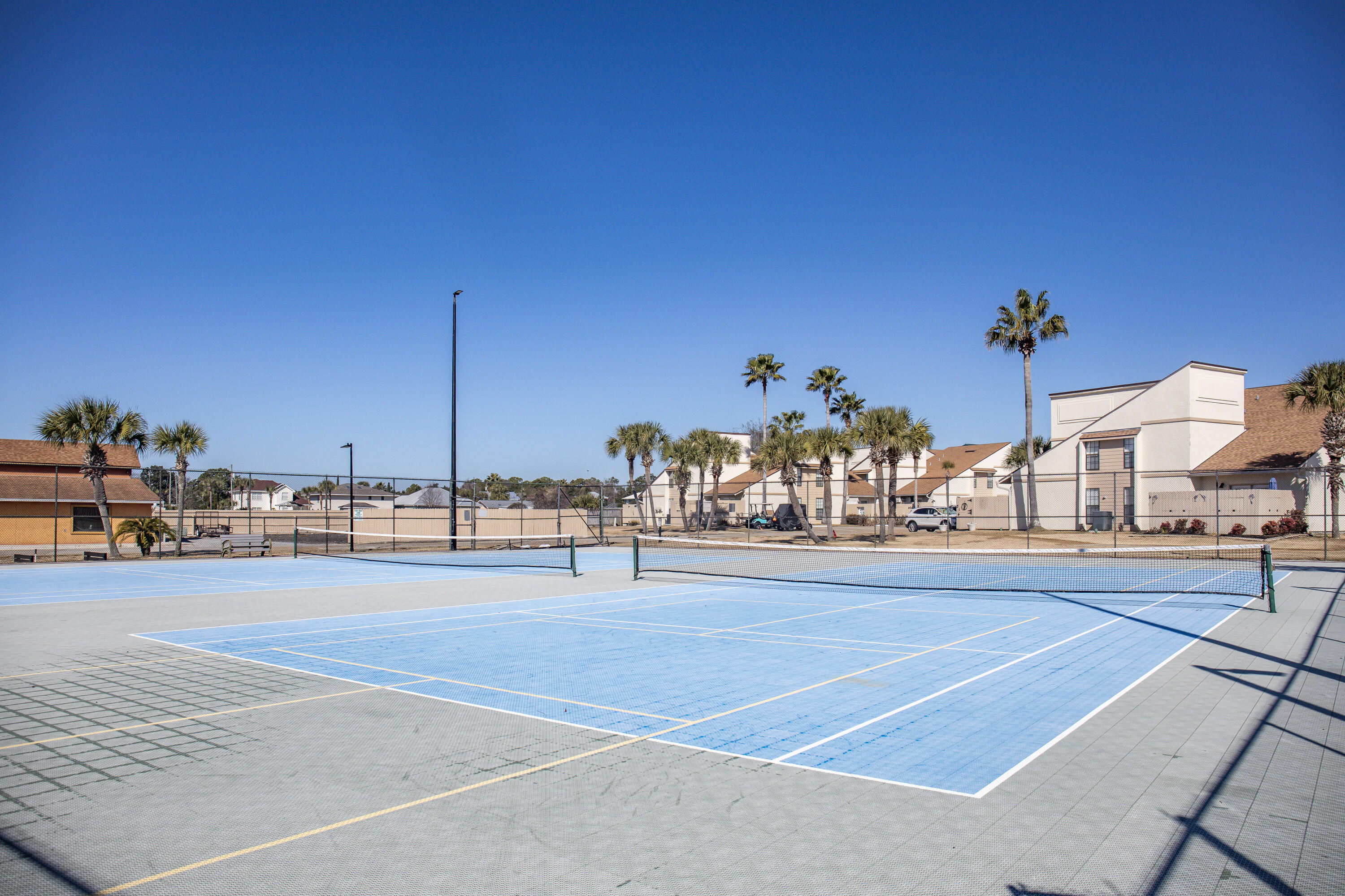 17462 Front Beach Road, Unit 38B Panama City Beach, FL 32413 - Photo 33 of 39 a view of a tennis court