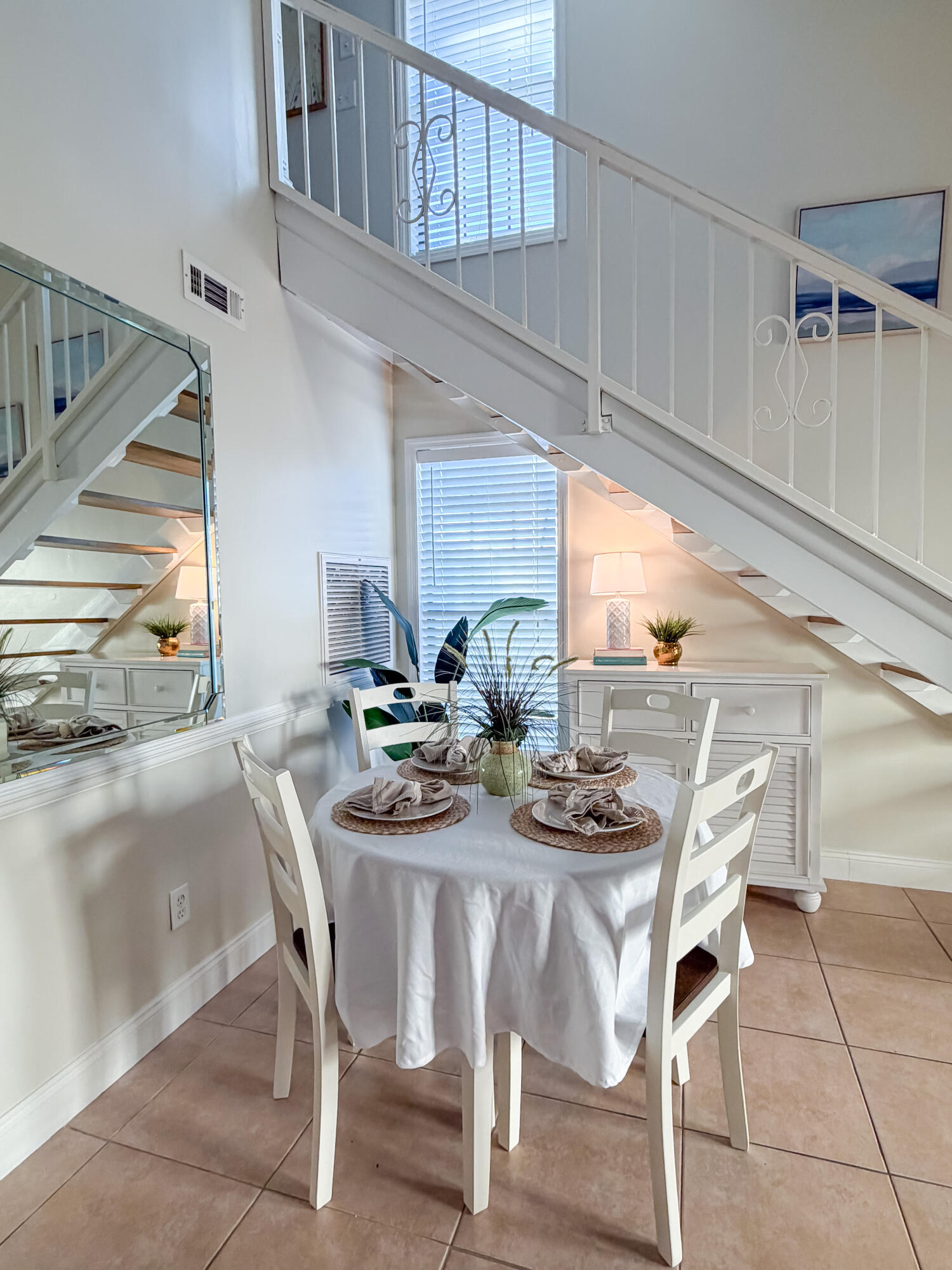 17462 Front Beach Road, Unit 38B Panama City Beach, FL 32413 - Photo 7 of 39 a dining room with furniture and a window