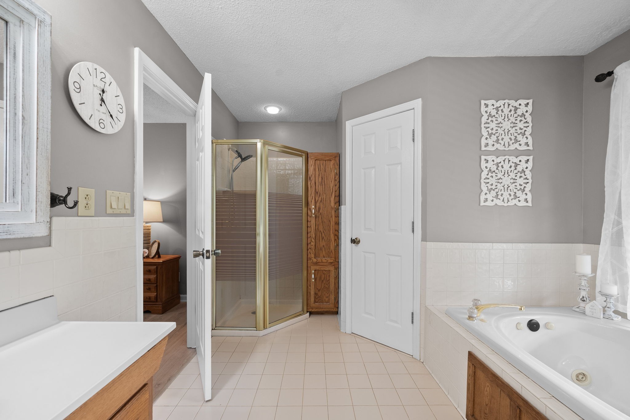 2430 Underwood Road Cunningham, TN 37052 - Photo 21 of 49 a bathroom with a bathtub and a shower