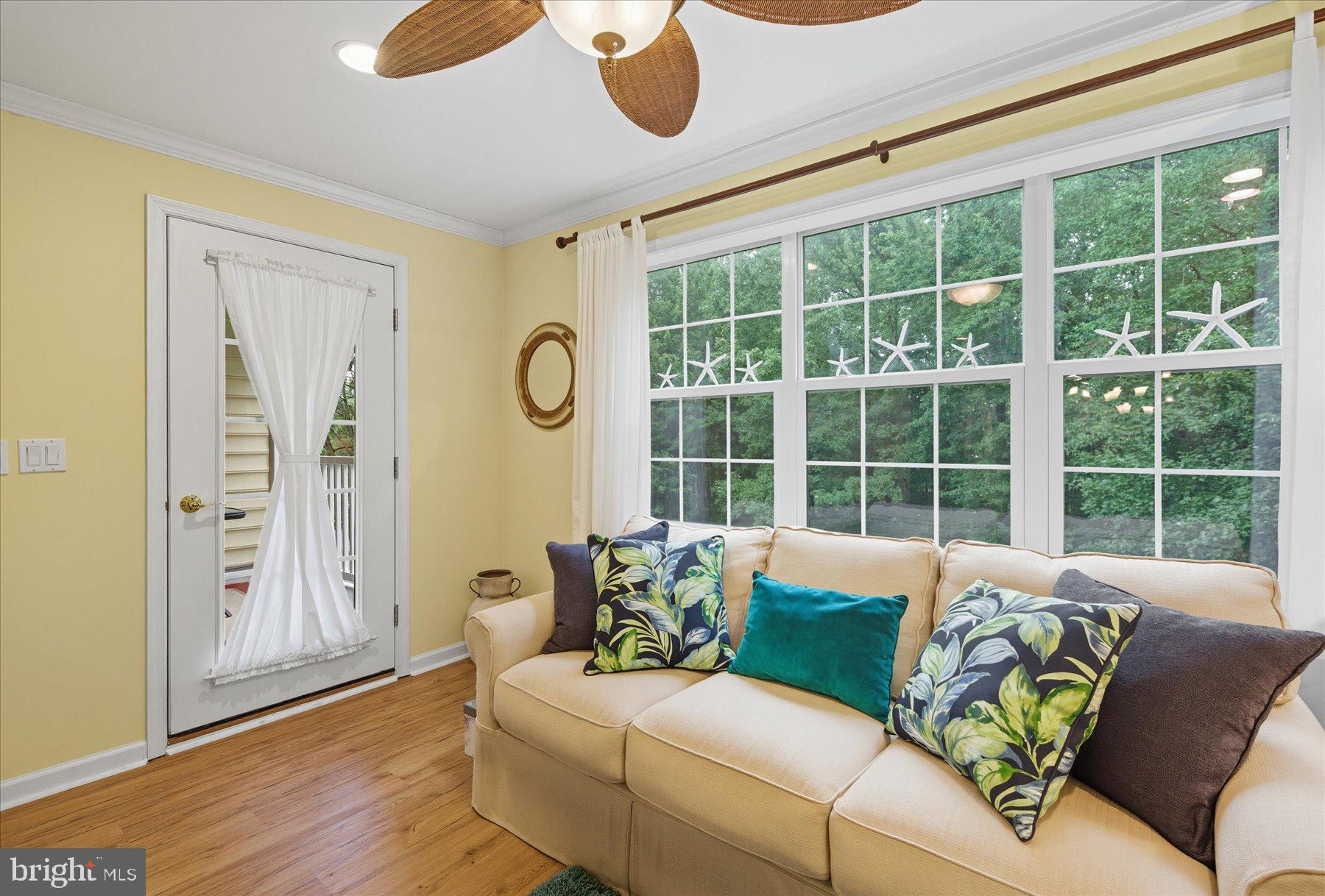30413 Cedar Neck Road, Unit 206 Ocean View, DE 19970 - Photo 24 of 65 Sunroom with Access to Porch
