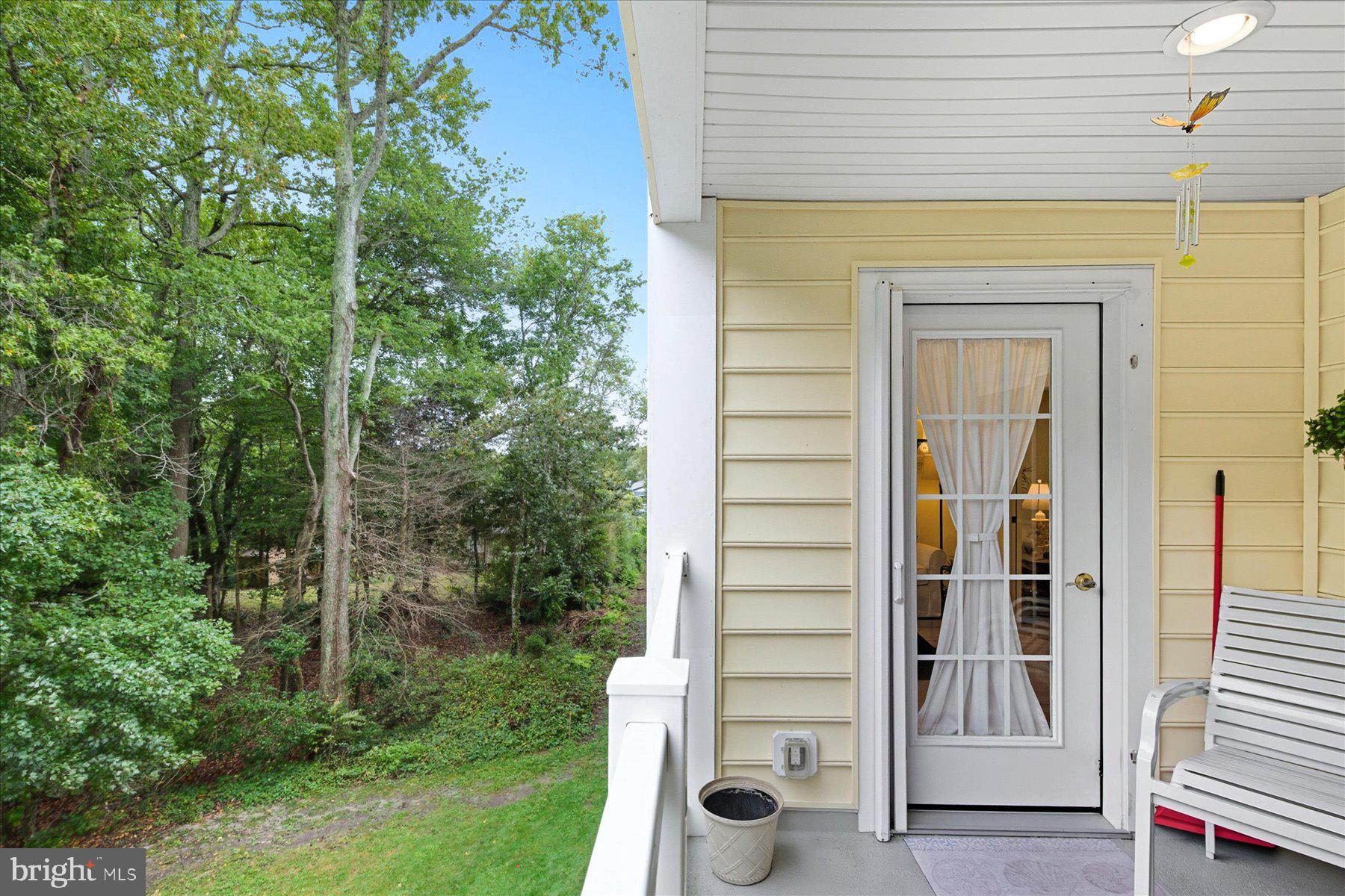 30413 Cedar Neck Road, Unit 206 Ocean View, DE 19970 - Photo 50 of 65 Porch with Door to Sunroom