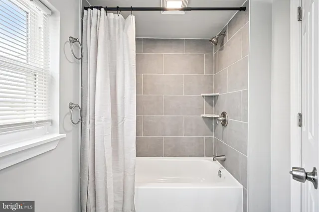 a bathroom with a bathtub