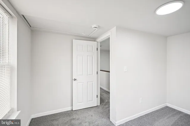 a view of a room with a hallway
