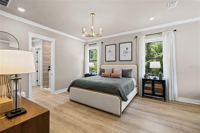 a living room with a walk in closet and a window