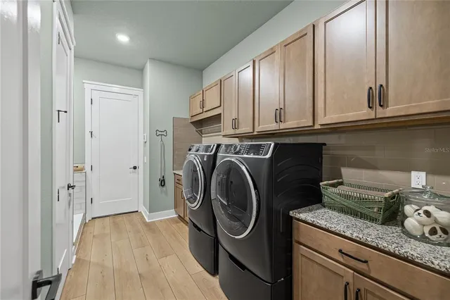 a aerial view of a house with a lake view