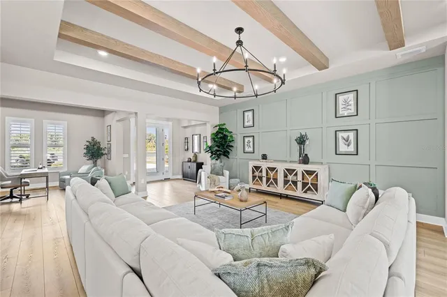 a kitchen with white cabinets and appliances