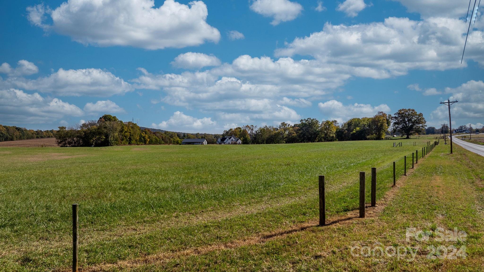 Lot 1 Hobson Road Cleveland, NC 27013 - Photo 3 of 20 a view of a lake with a big yard