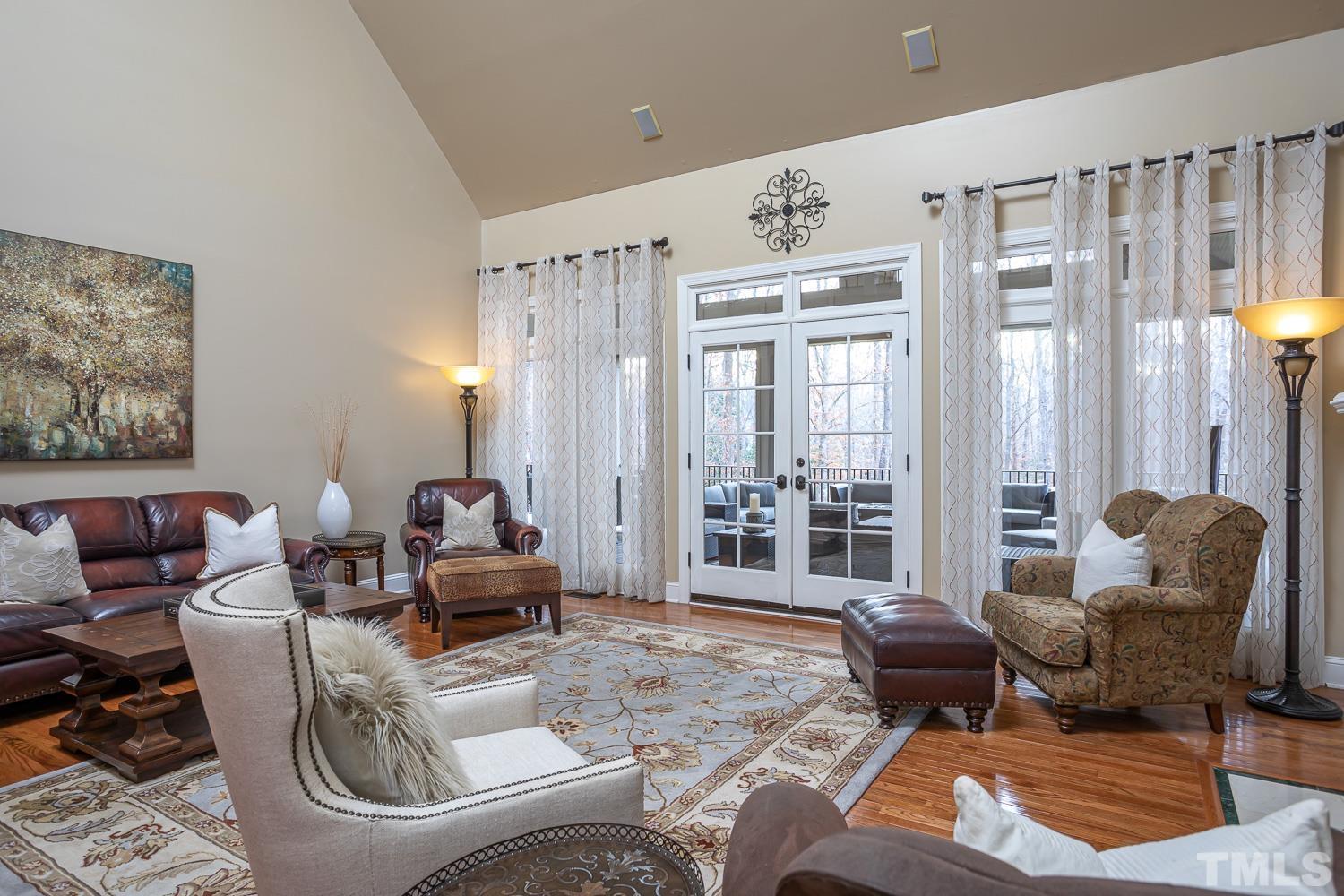 1616 Morning Mountain Road Raleigh, NC 27614 - Photo 11 of 86 a living room with furniture or couch and a large window