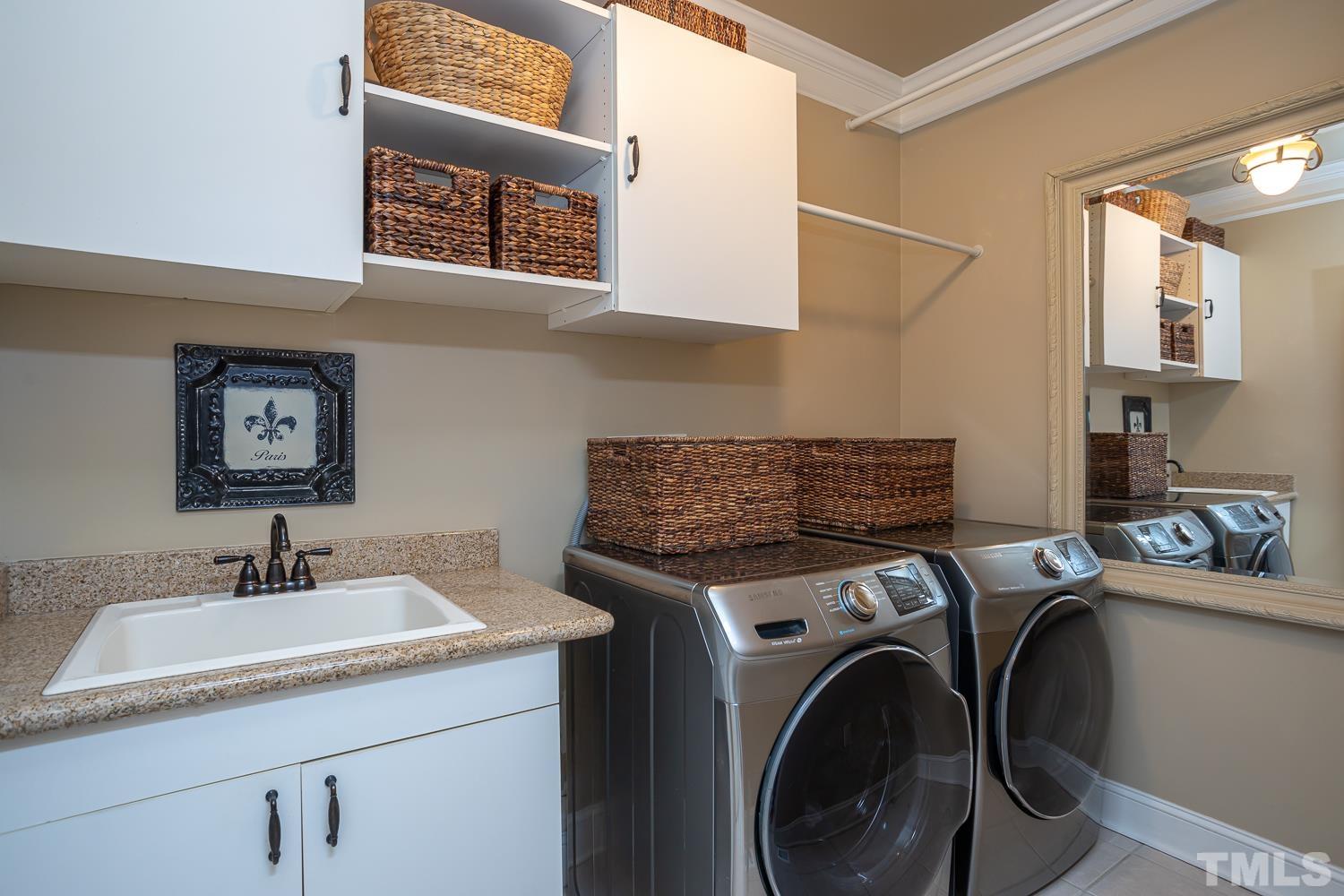 1616 Morning Mountain Road Raleigh, NC 27614 - Photo 20 of 86 a utility room with dryer and washer