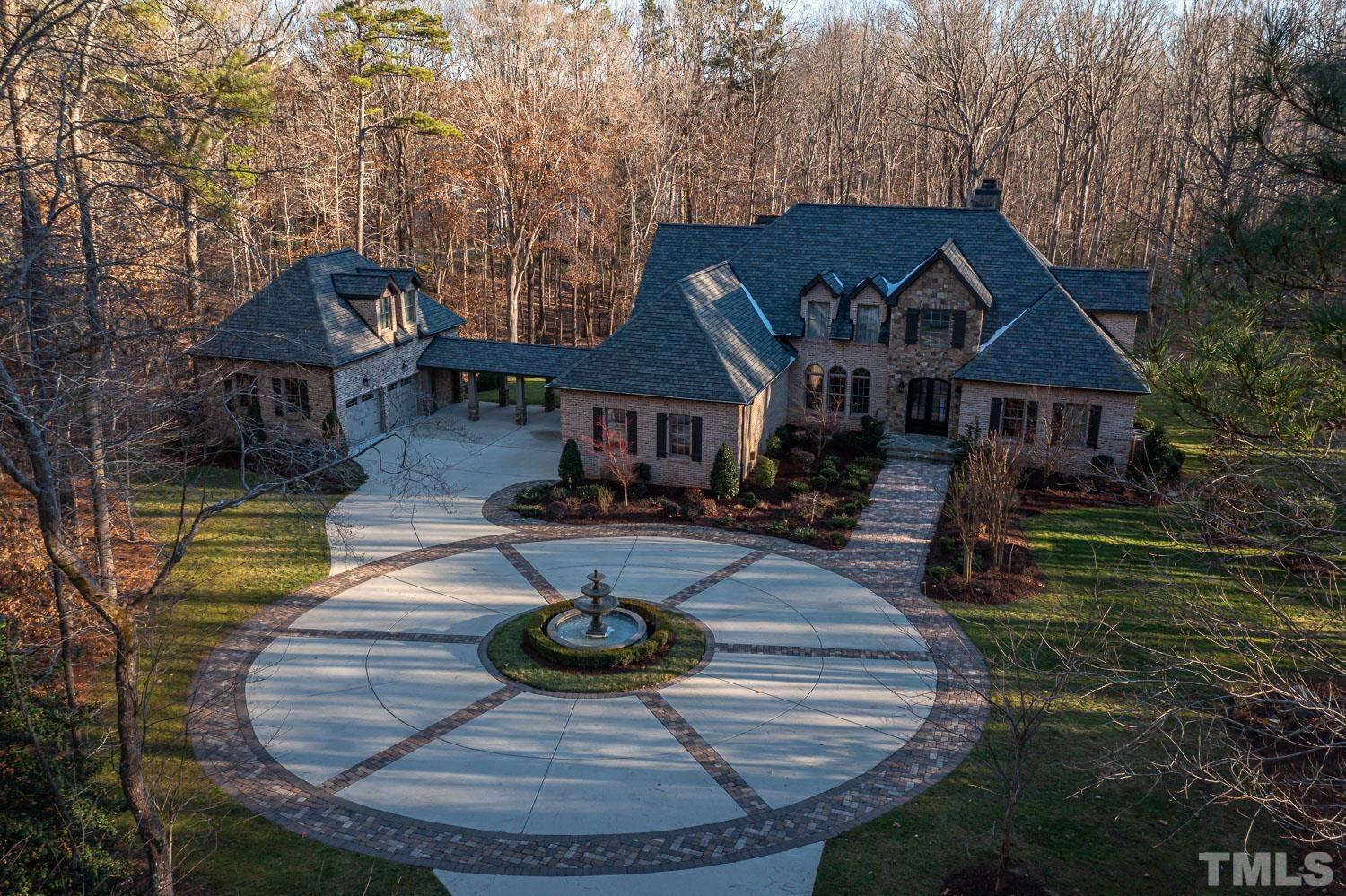 1616 Morning Mountain Road Raleigh, NC 27614 - Photo 2 of 86 a front view of a house with garden