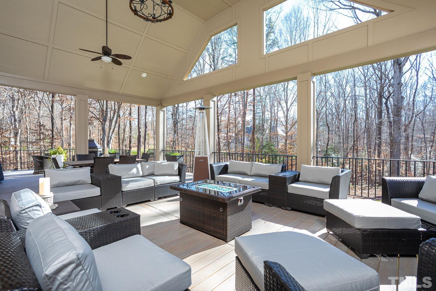 1616 Morning Mountain Road Raleigh, NC 27614 - Photo 30 of 86 a living room with furniture and a large window