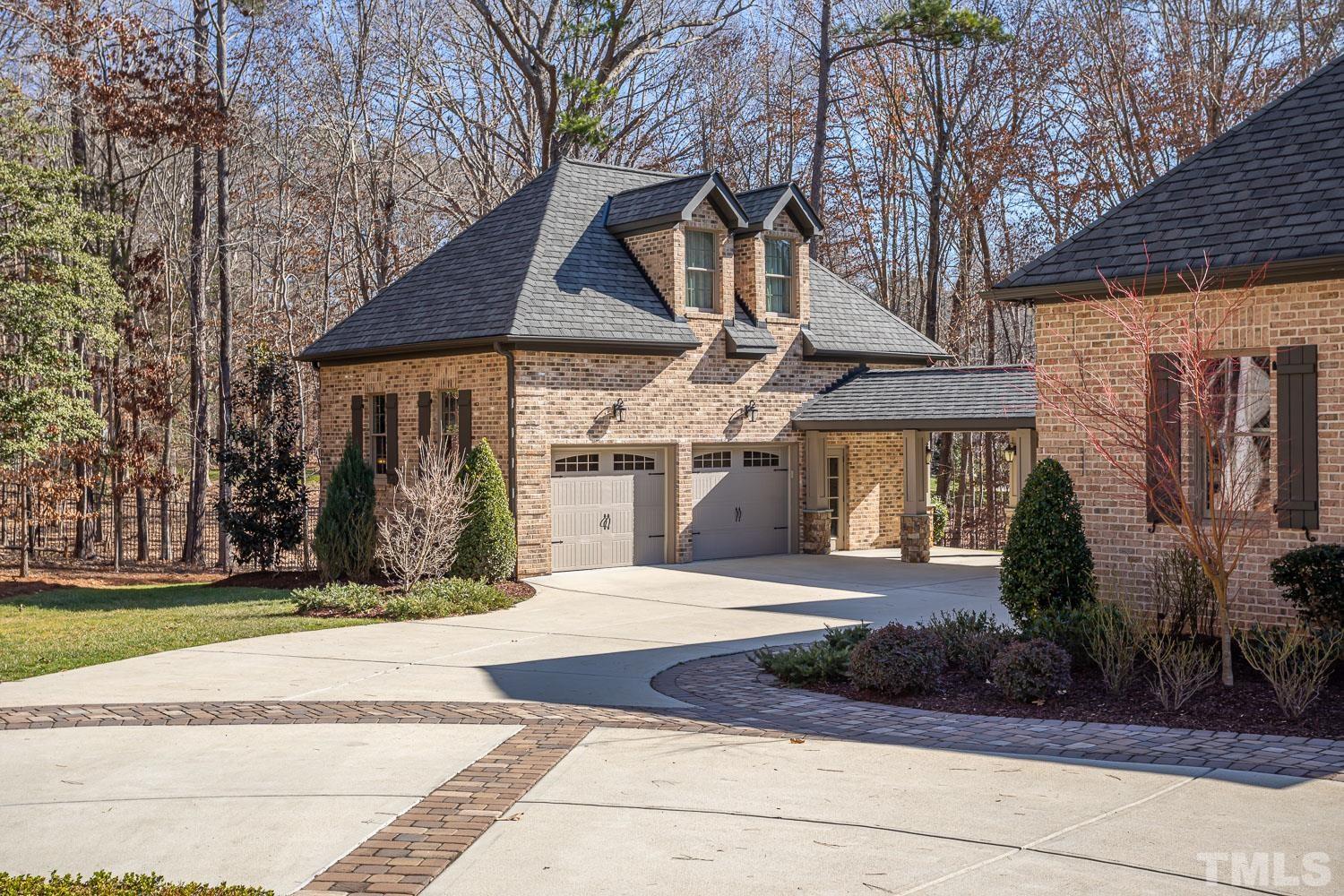 1616 Morning Mountain Road Raleigh, NC 27614 - Photo 3 of 86 a front view of a house with garage and plants