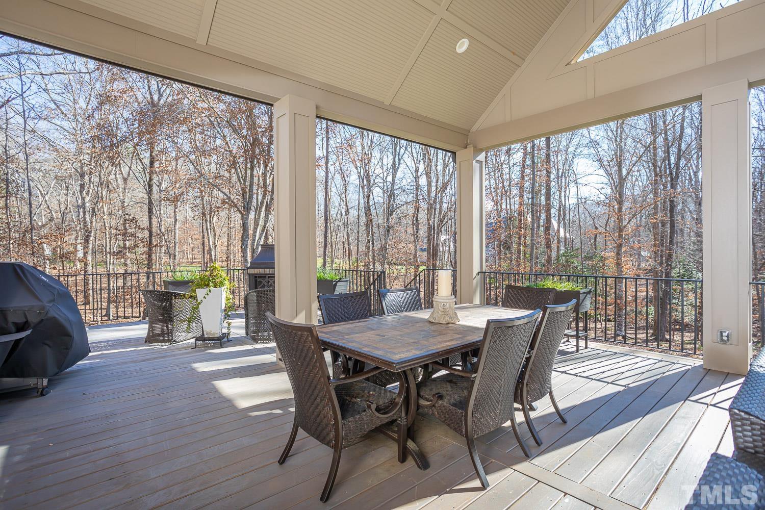 1616 Morning Mountain Road Raleigh, NC 27614 - Photo 31 of 86 a view of a dining room with furniture window and wooden floor