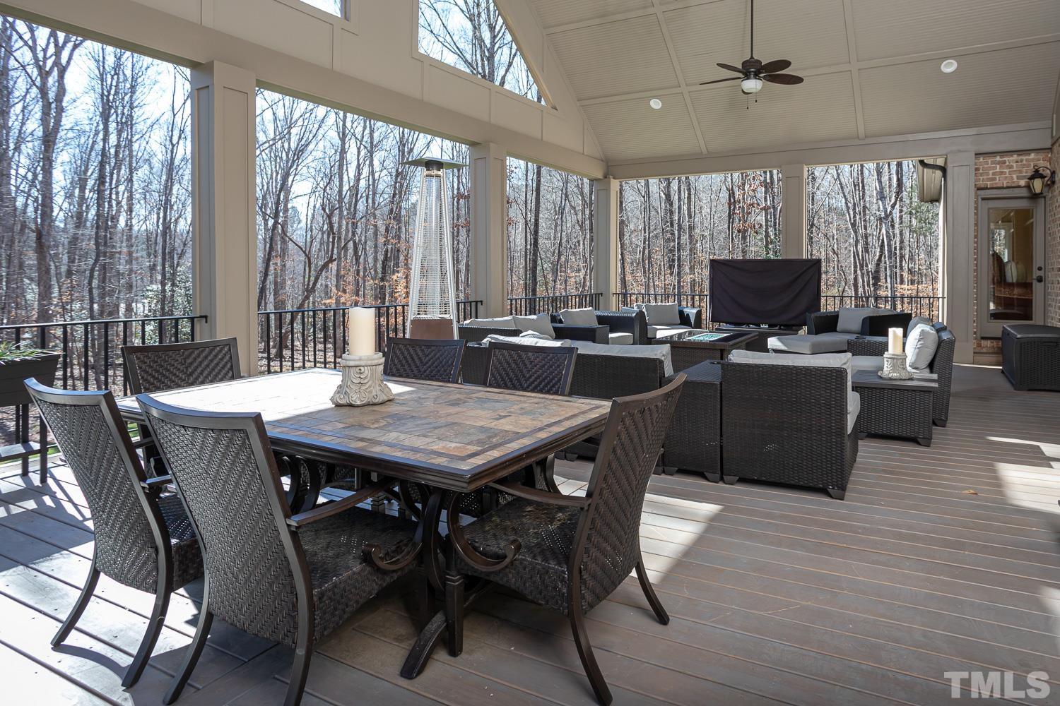 1616 Morning Mountain Road Raleigh, NC 27614 - Photo 32 of 86 a view of a dining room with furniture window and wooden floor