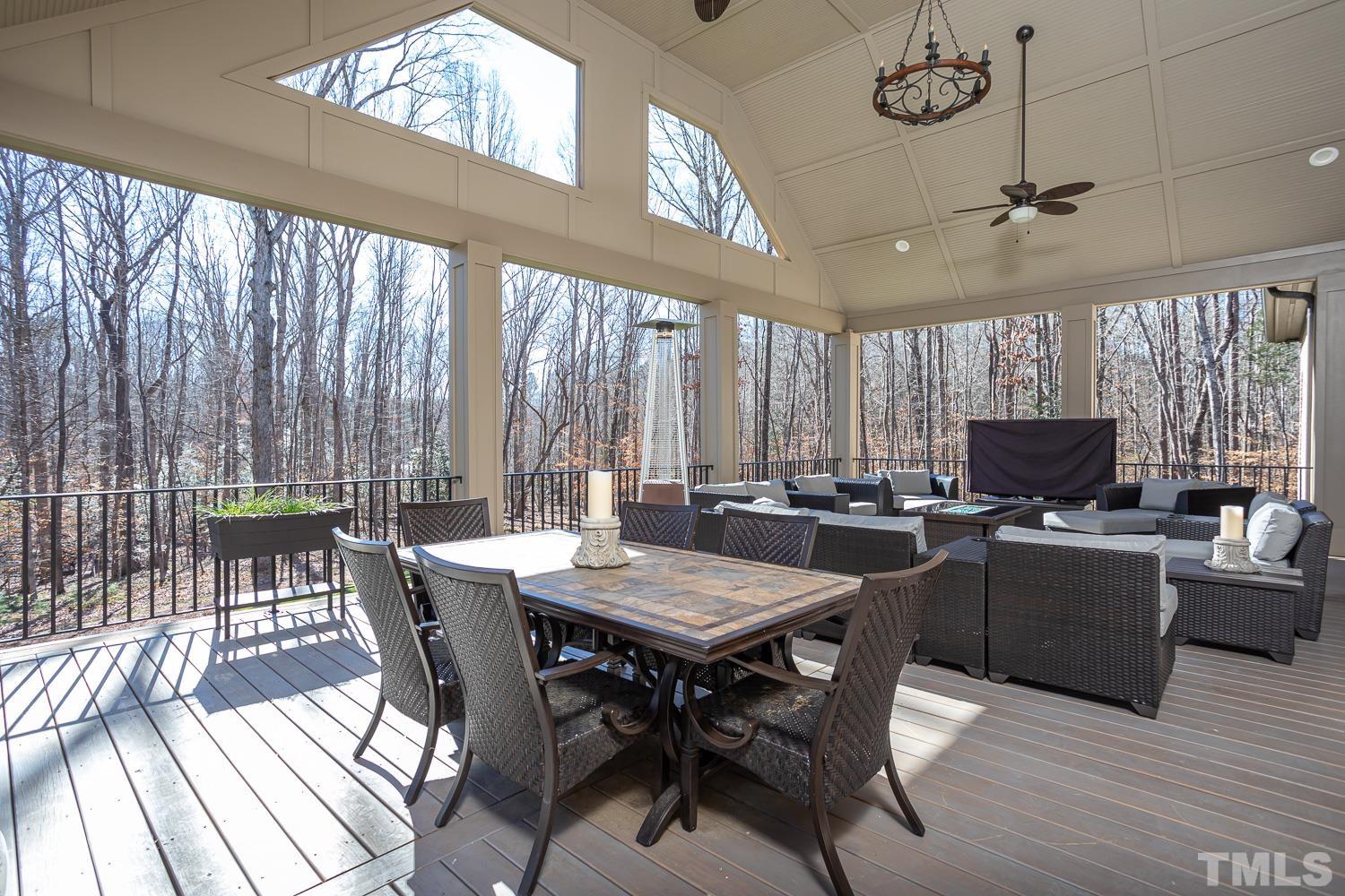 1616 Morning Mountain Road Raleigh, NC 27614 - Photo 33 of 86 a view of a dining room with furniture window and wooden floor