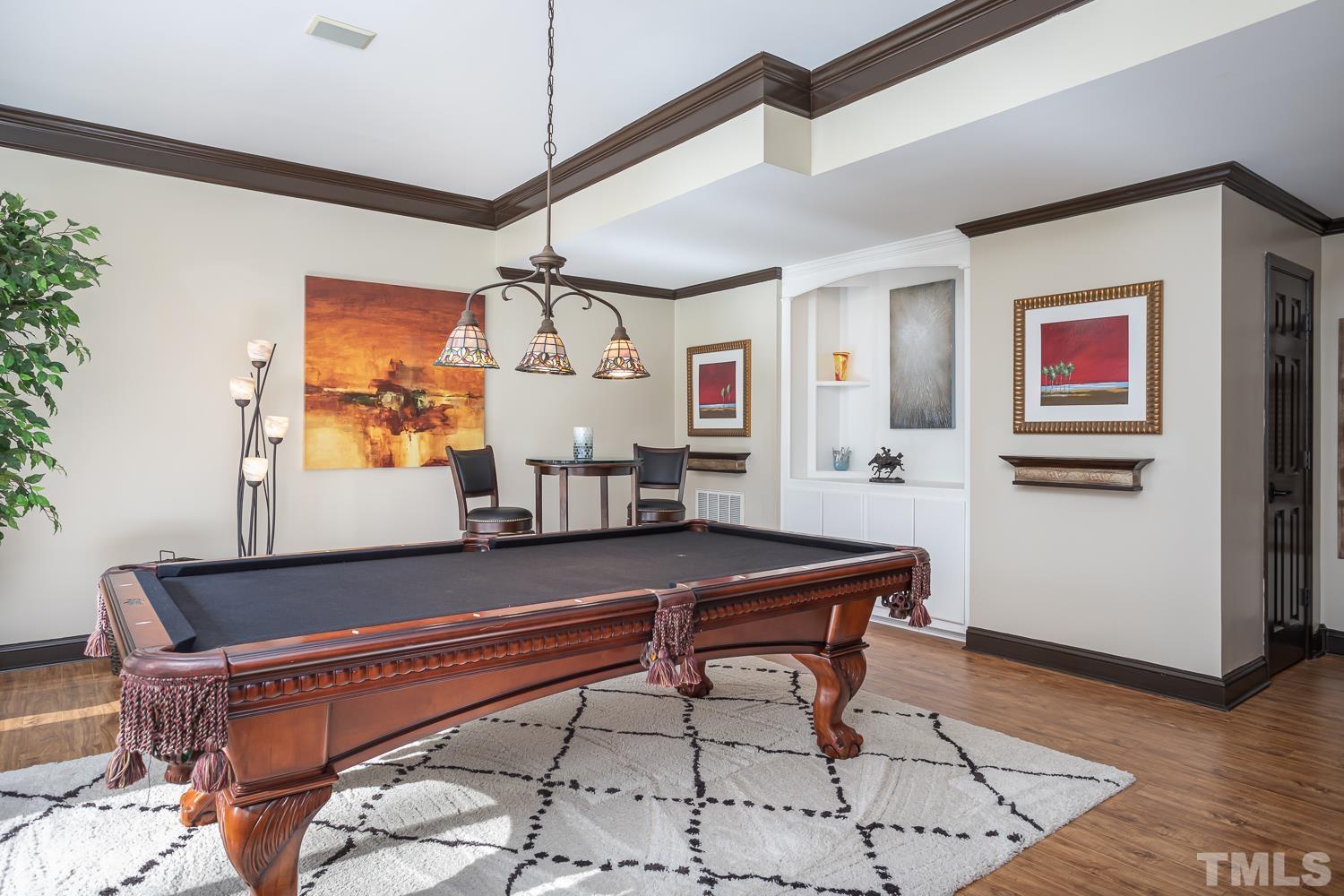 1616 Morning Mountain Road Raleigh, NC 27614 - Photo 57 of 86 a living room with furniture and wooden floor