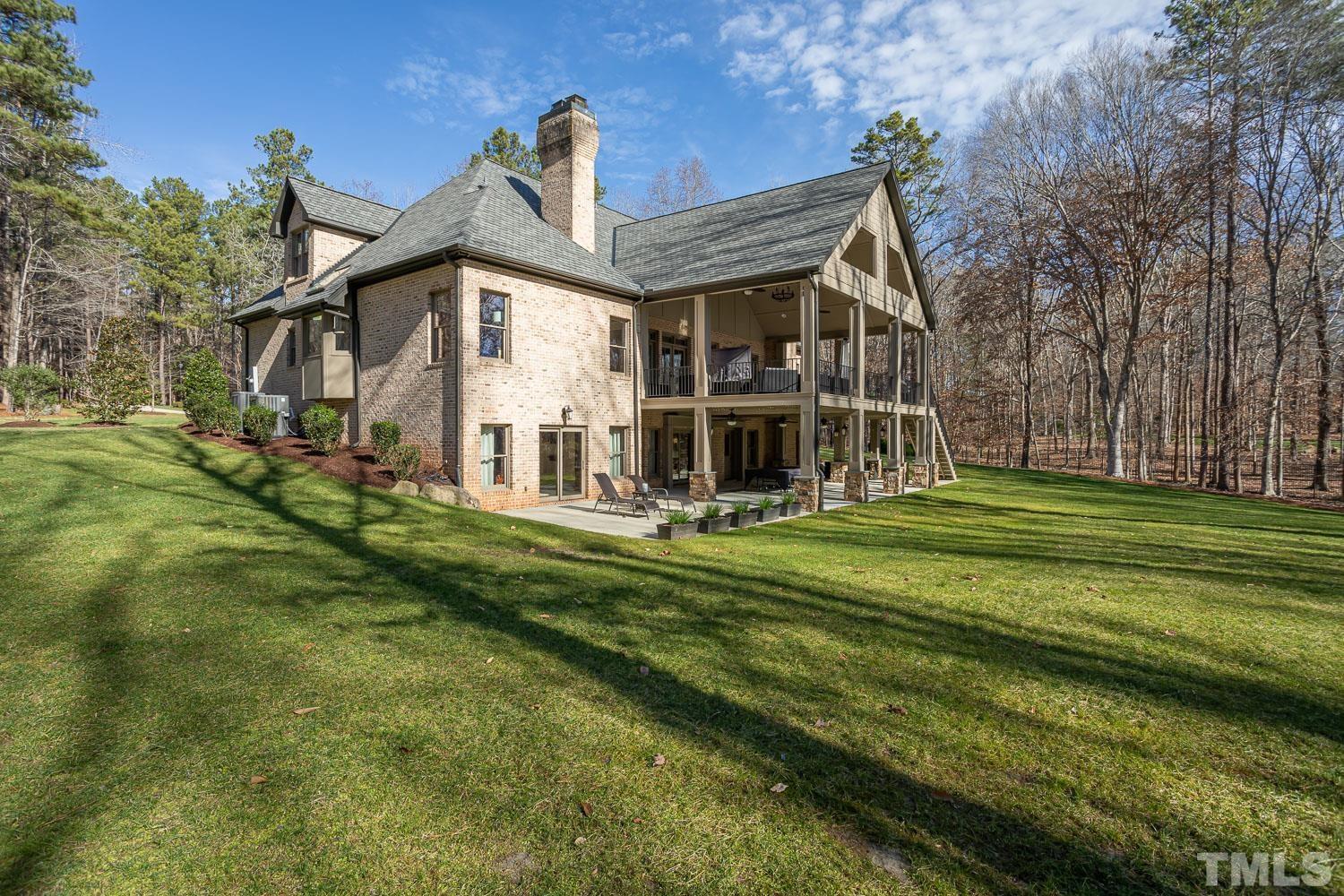 1616 Morning Mountain Road Raleigh, NC 27614 - Photo 63 of 86 a front view of a house with a garden