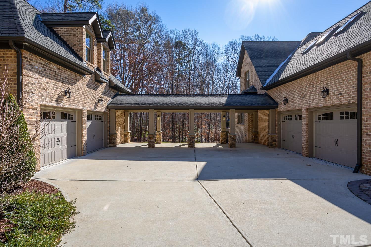 1616 Morning Mountain Road Raleigh, NC 27614 - Photo 75 of 86 a front view of a house with basket ball court and outdoor seating