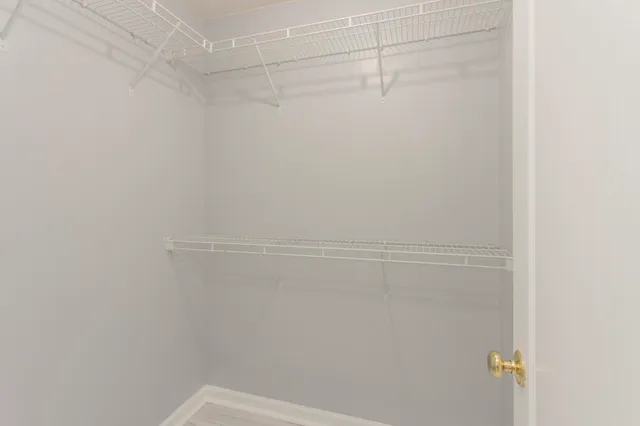 a bathroom with a shower and a bath tub