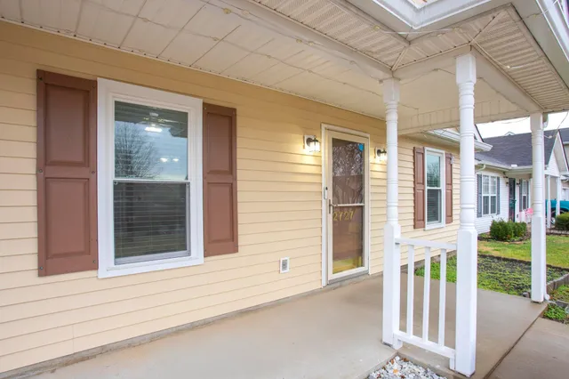 a view of a house with a porch
