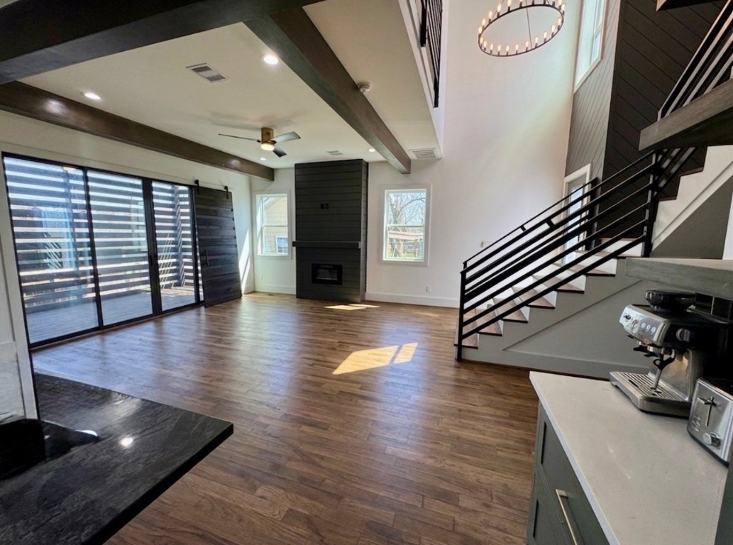 505 East 40th Street Houston, TX 77022 - Photo 3 of 17 a view of a livingroom with wooden floor and stairs