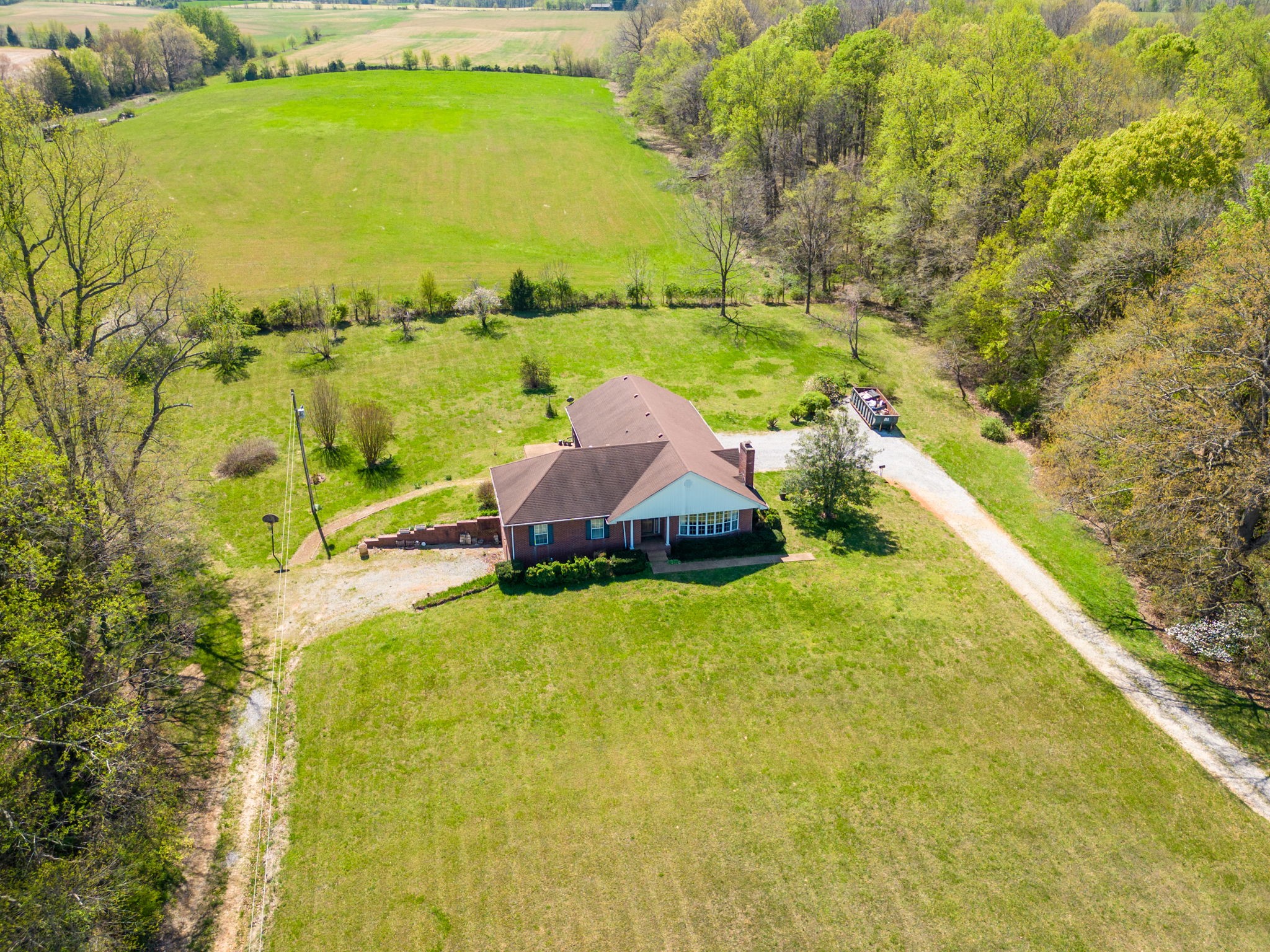 9139 Owens Chapel Road Springfield, TN 37172 - Photo 1 of 29 a view of a lake with a big yard