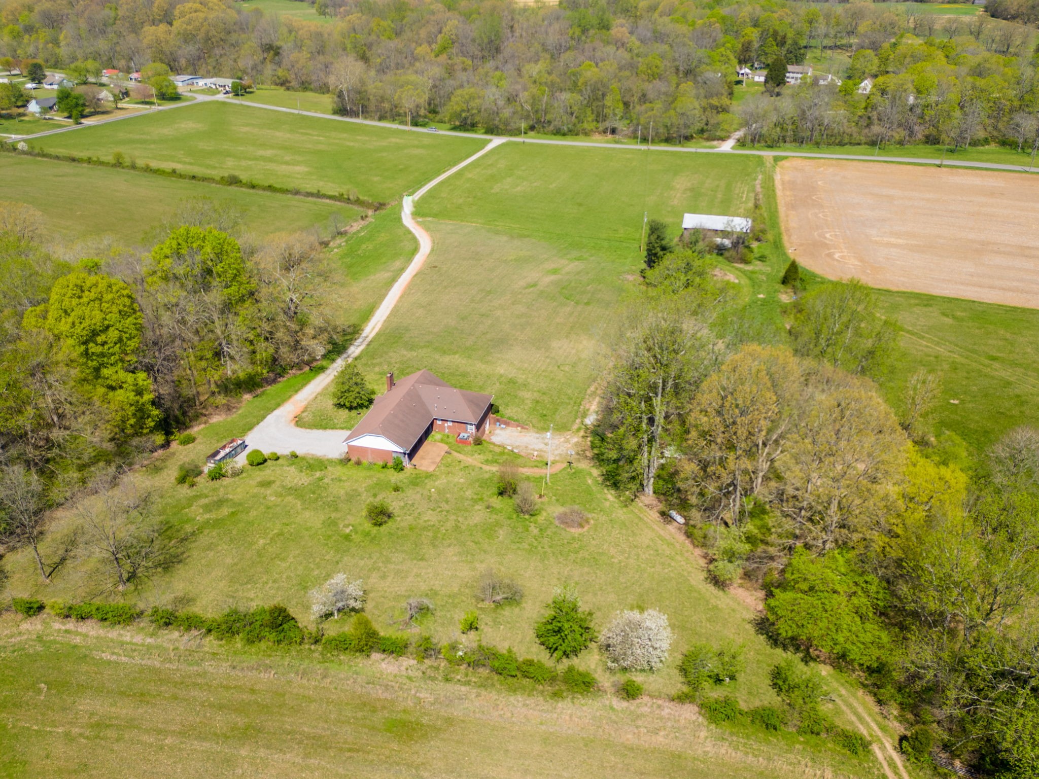 9139 Owens Chapel Road Springfield, TN 37172 - Photo 2 of 29 a view of a lake with a big yard