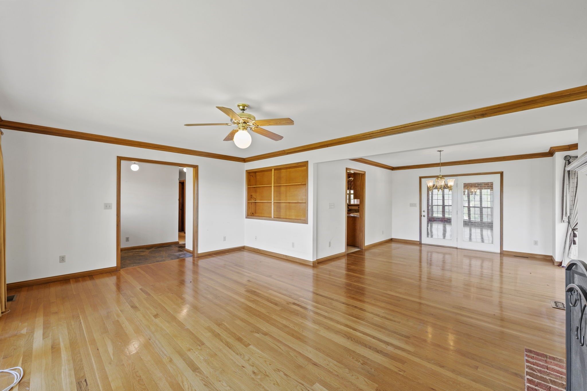 9139 Owens Chapel Road Springfield, TN 37172 - Photo 21 of 29 a view of an empty room with window and wooden floor
