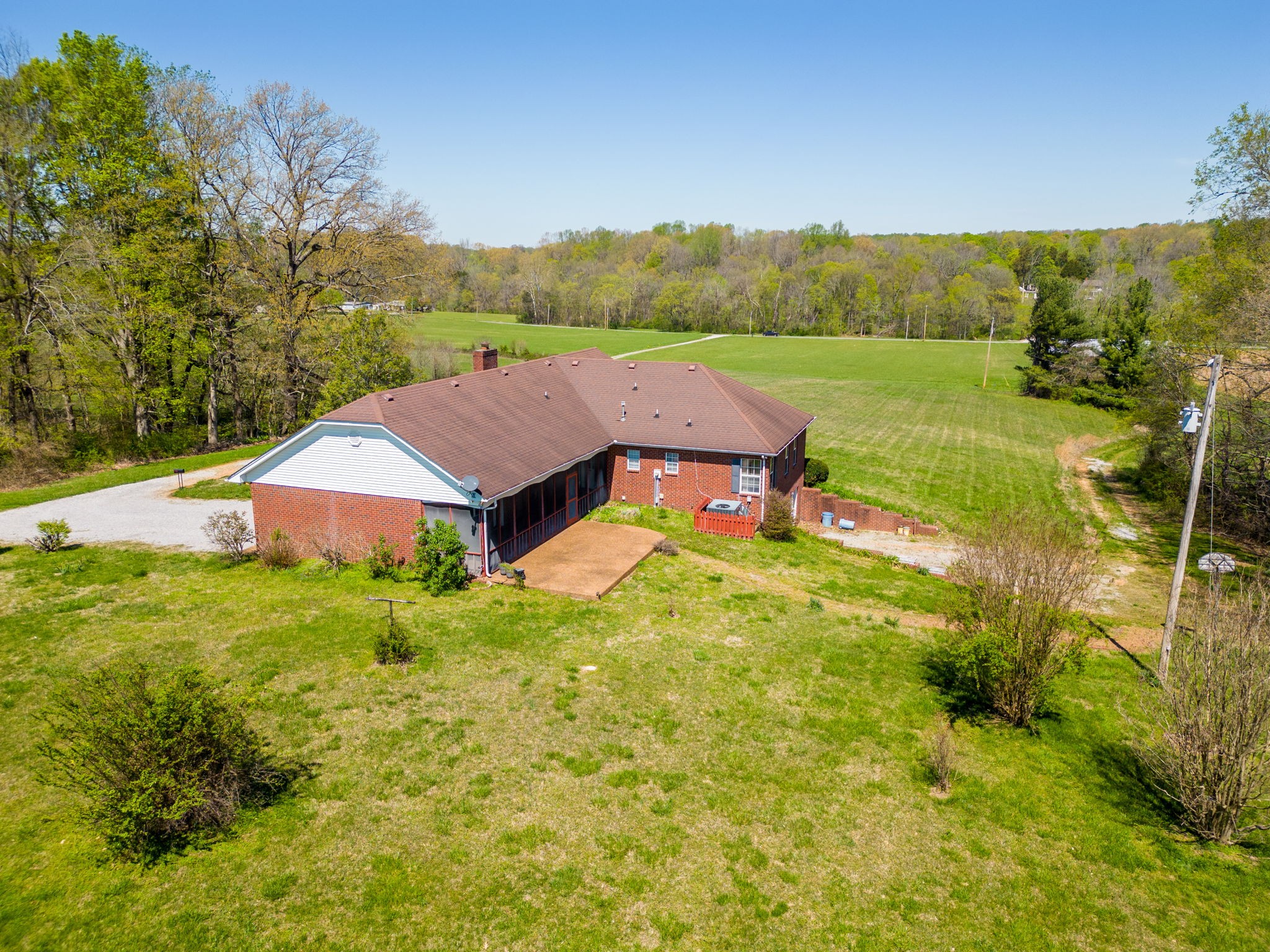 9139 Owens Chapel Road Springfield, TN 37172 - Photo 23 of 29 a view of a house with a yard and pool