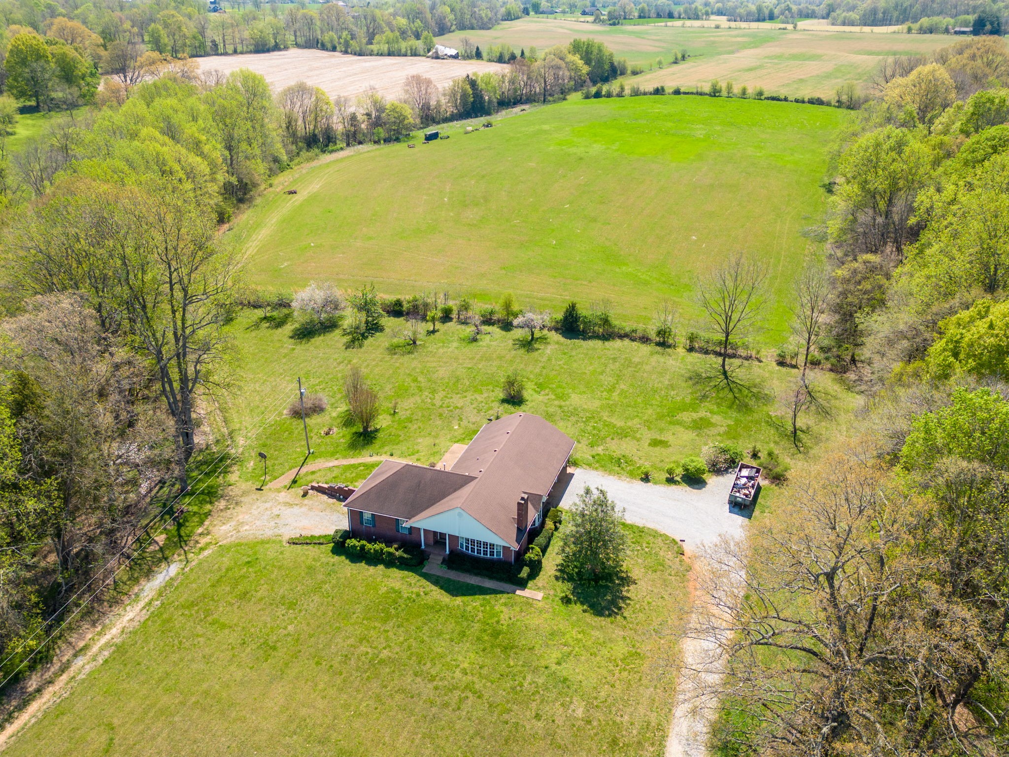 9139 Owens Chapel Road Springfield, TN 37172 - Photo 26 of 29 a view of a lake with a yard