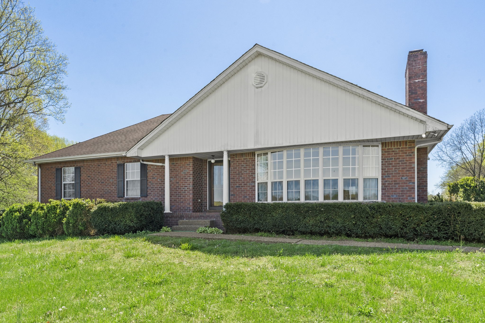 9139 Owens Chapel Road Springfield, TN 37172 - Photo 10 of 29 a front view of a house with a yard and porch