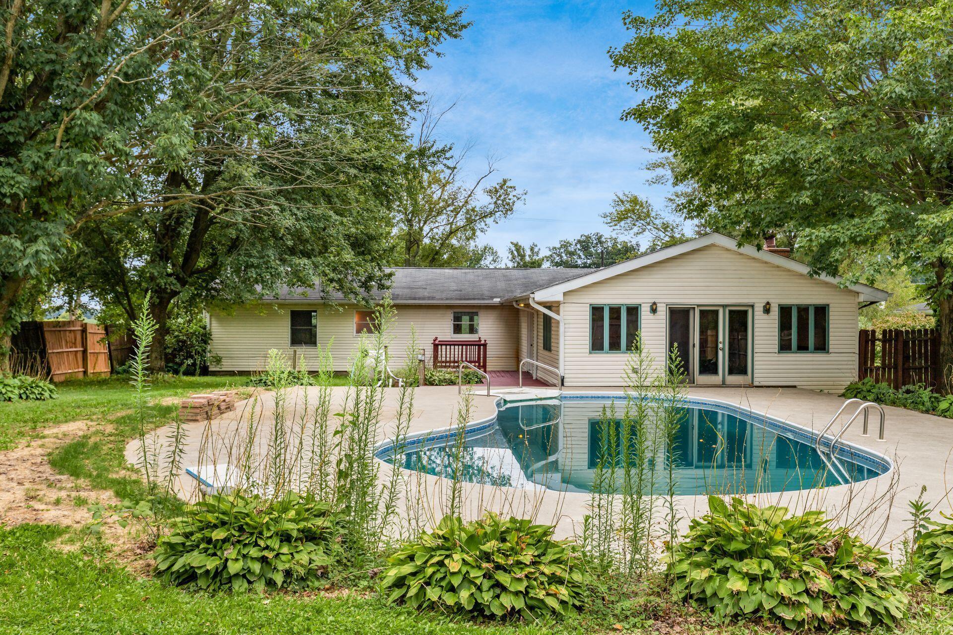 264 Morral-Kirkpatrick Road Marion, OH 43302 - Photo 29 of 37 32'x16' pool (new liner 2020) with large concrete sunning deck plus wood deck!