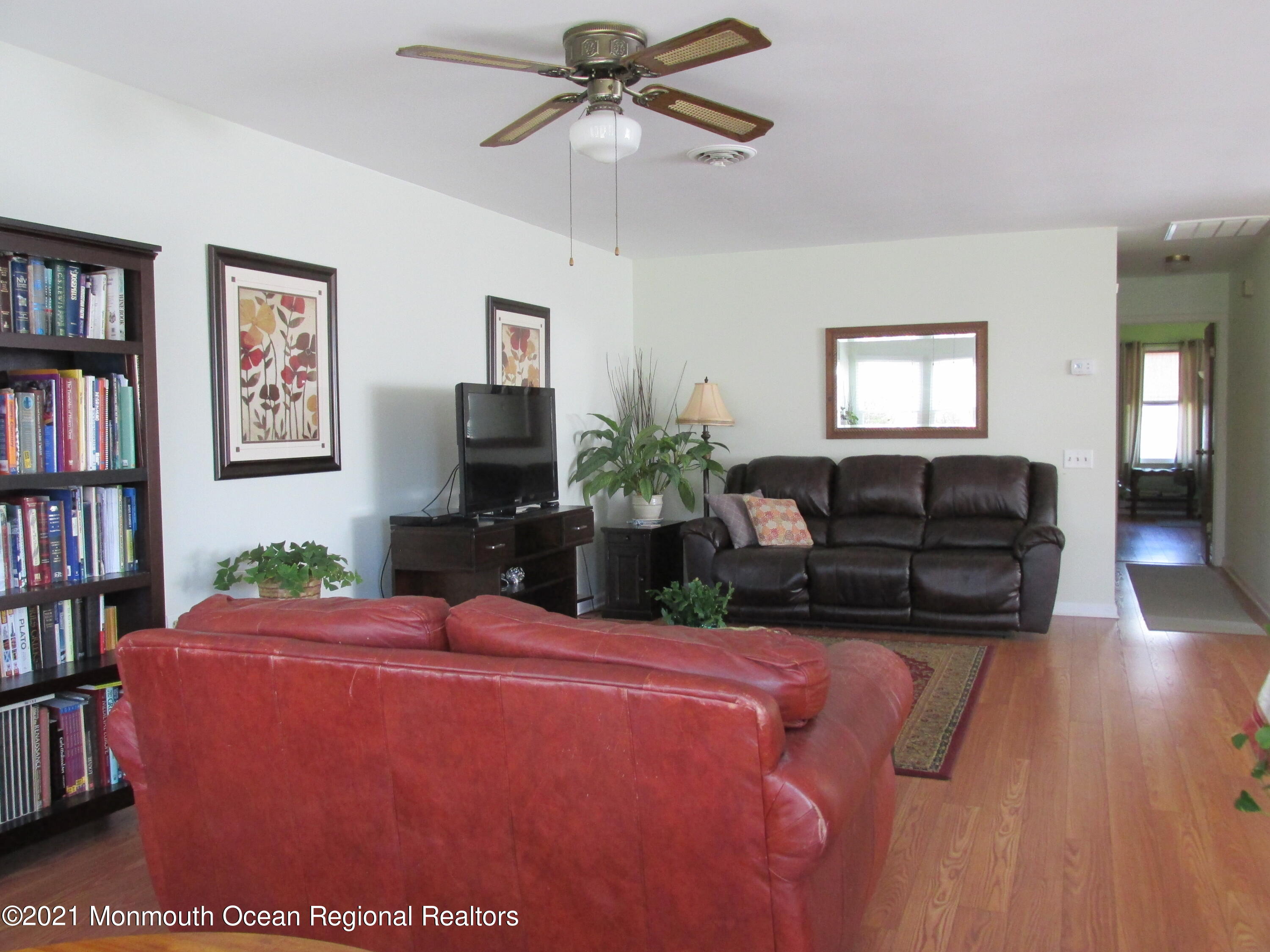 7 A Mill Road Whiting, NJ 08759 - Photo 3 of 38 a living room with furniture and a flat screen tv