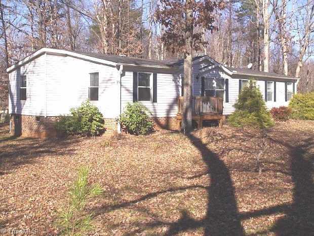 7144 Racine Road Pleasant Garden, NC 27313 - Photo 1 of 9 Exterior Front.