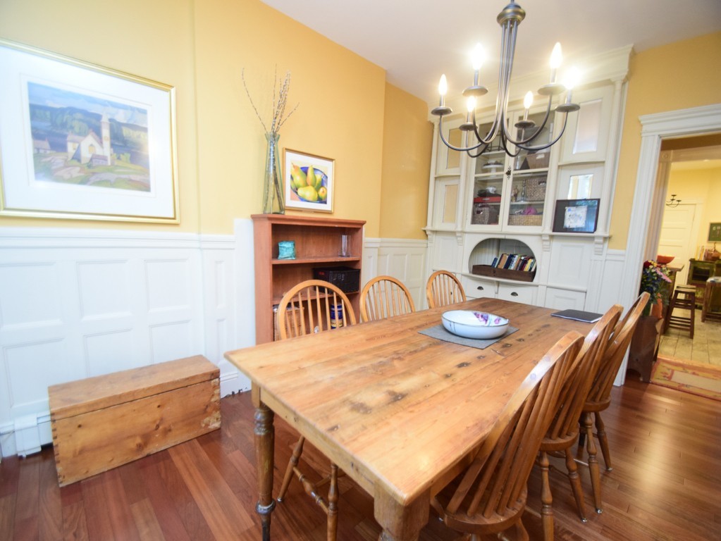 17 Strathmore Road, Unit 1 Brookline, MA 02445 - Photo 8 of 19 a dinning table and chairs in a room