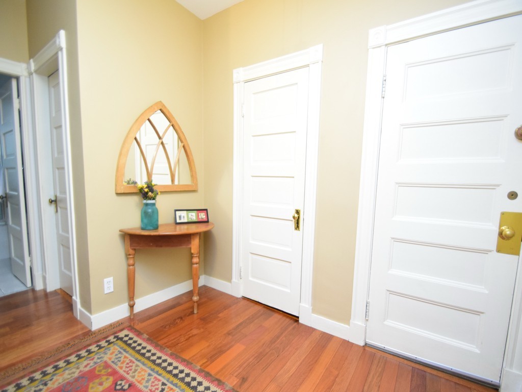 17 Strathmore Road, Unit 1 Brookline, MA 02445 - Photo 10 of 19 a view of an empty room and wooden floor