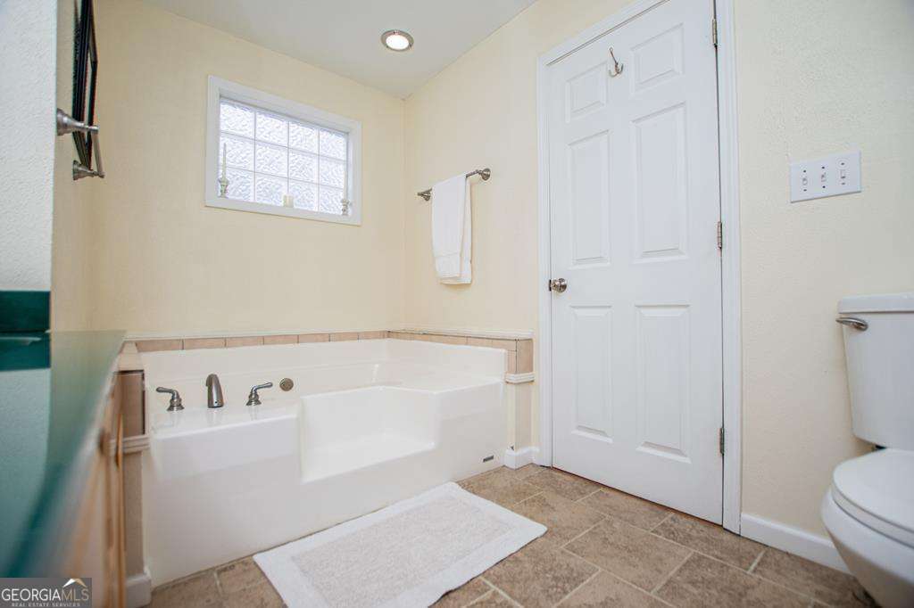 2 Pine Hill Drive Ranburne, AL 36273 - Photo 42 of 91 a bathroom with a bathtub and a toilet