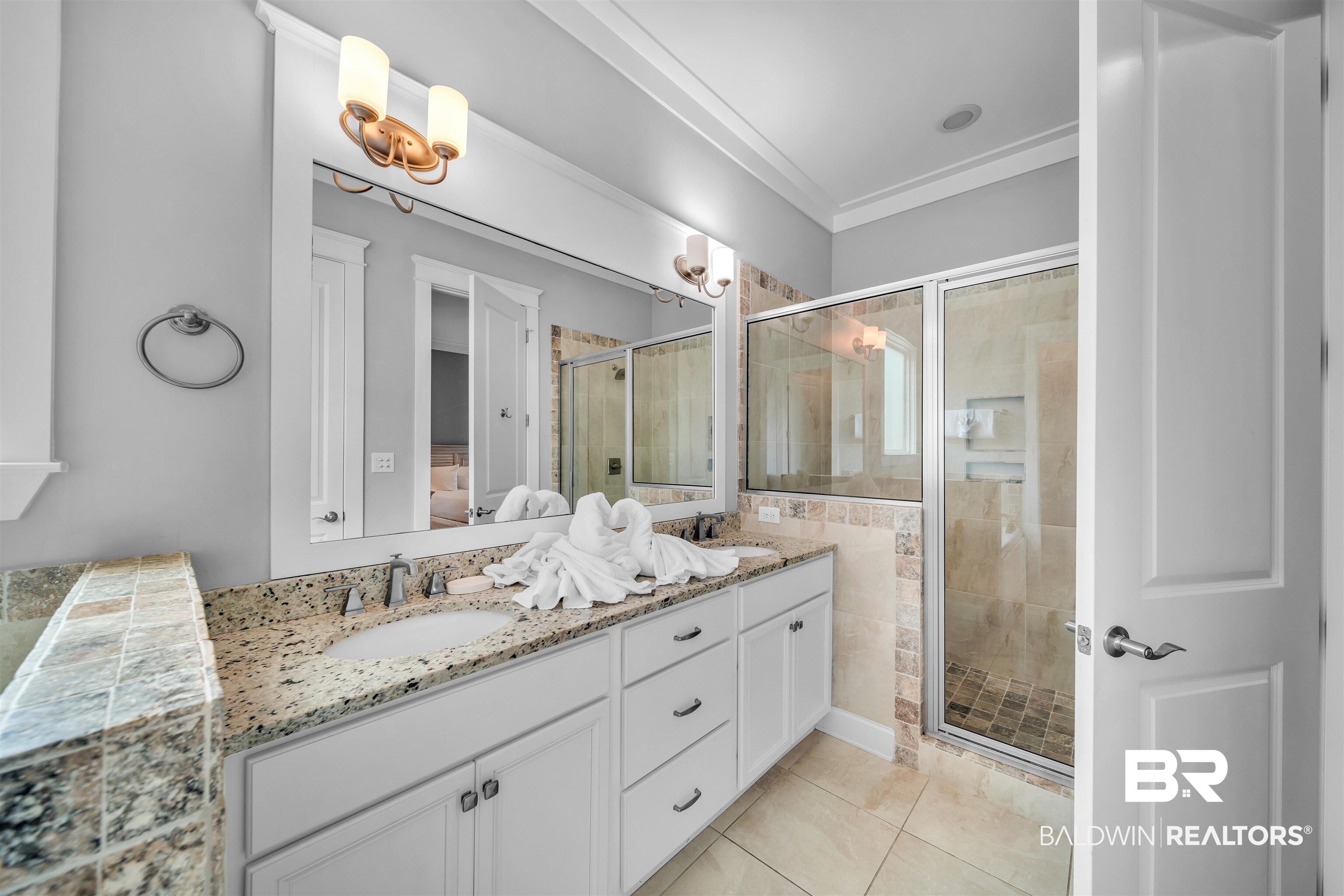 47 Parks Edge Orange Beach, AL 36561 - Photo 12 of 40 Full bathroom with double vanity, a stall shower, ornamental molding, and tile patterned flooring