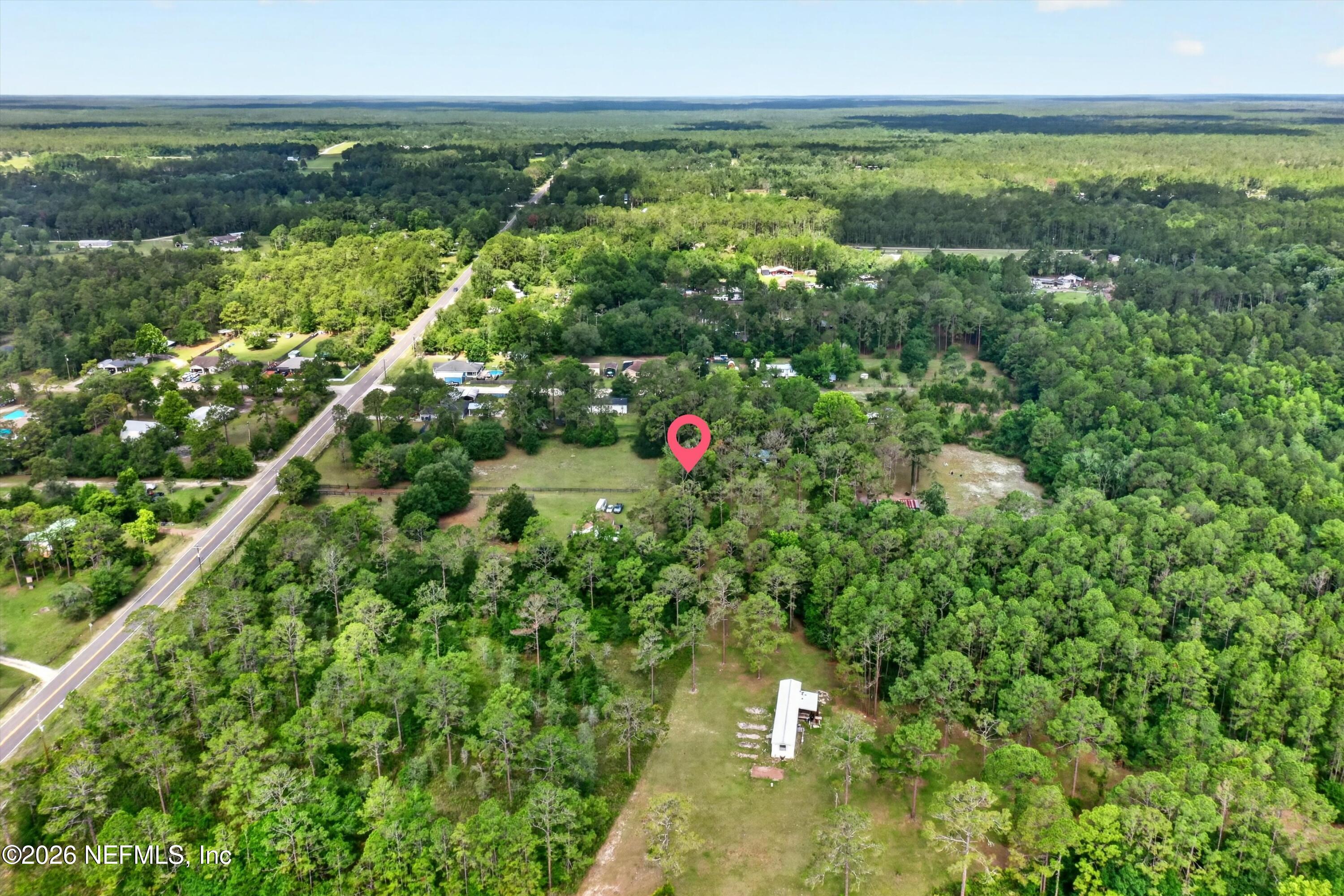 5214 Carter Spencer Road Middleburg, FL 32068 - Photo 41 of 50 a view of a lake with a city