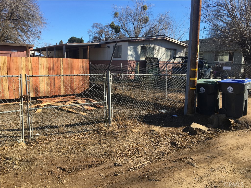 3892 Schultz Avenue Clearlake, CA 95422 - Photo 9 of 10 a view of a house with a yard