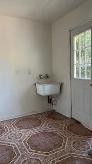 38709 Pond Avenue Palmdale, CA 93550 - Photo 20 of 24 a bathroom with a sink toilet and a window