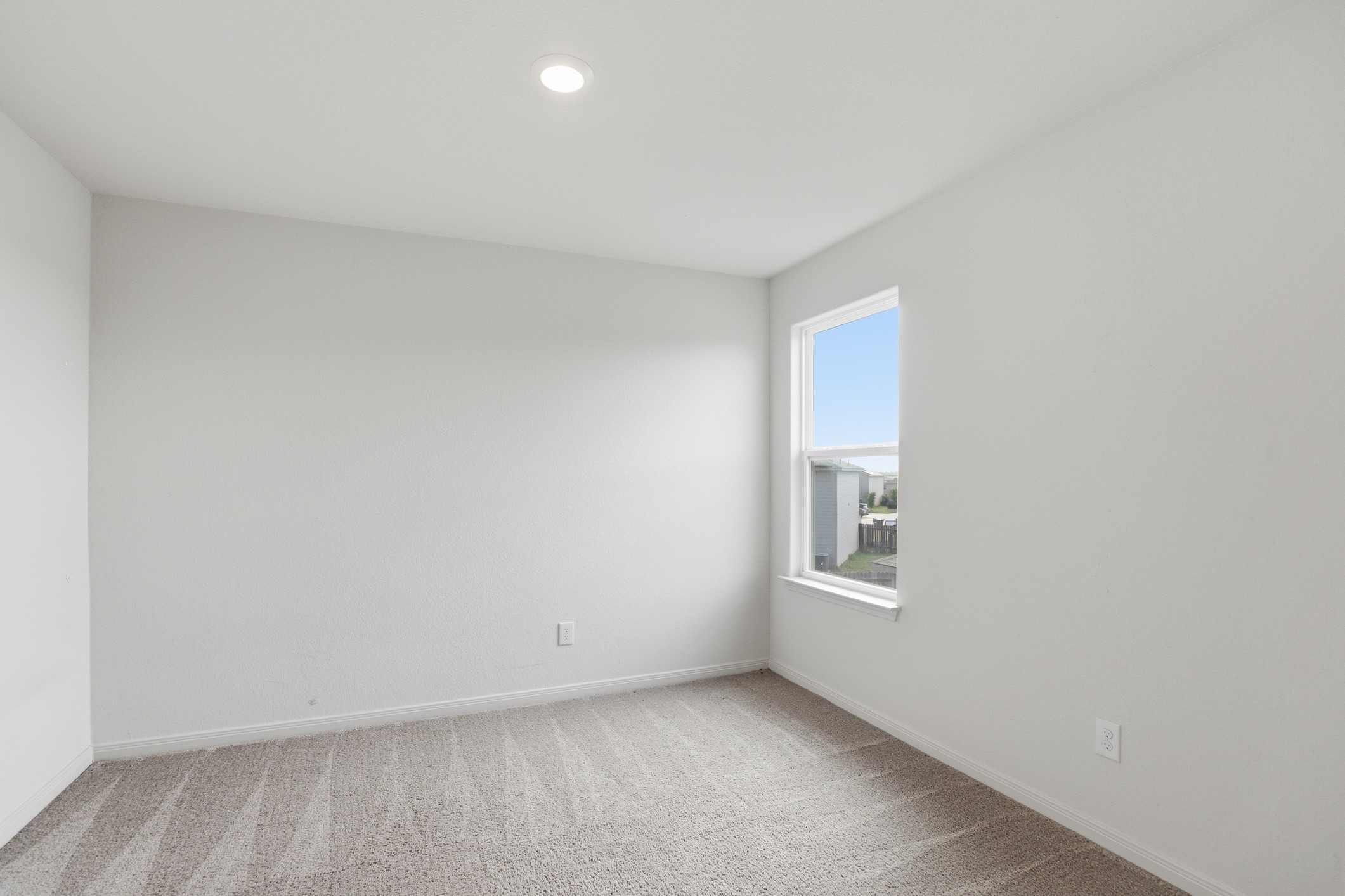 300 Hyacinth Way Jarrell, TX 76537 - Photo 31 of 37 a view of an empty room with a window