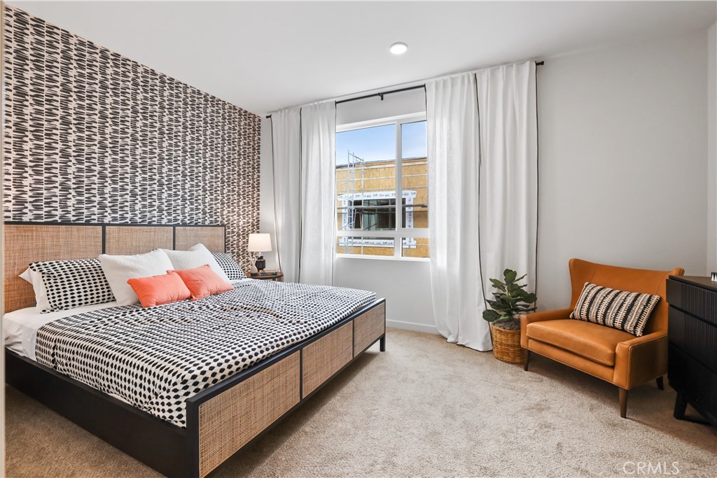 50 Bigsby Drive Stanton, CA 90680 - Photo 13 of 22 a bedroom with a bed and a couch