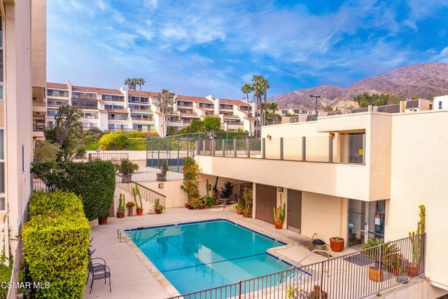 a view of a city with tall buildings